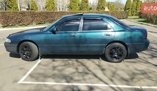 Зеленый Мазда 626, объемом двигателя 2 л и пробегом 611 тыс. км за 2600 $, фото 7 на Automoto.ua