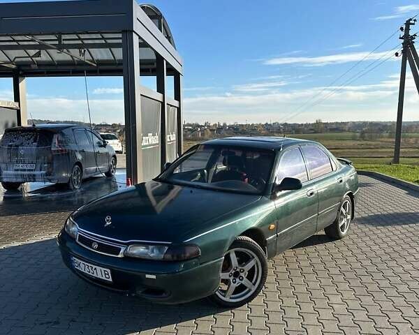 Зеленый Мазда 626, объемом двигателя 2 л и пробегом 300 тыс. км за 1300 $, фото 14 на Automoto.ua