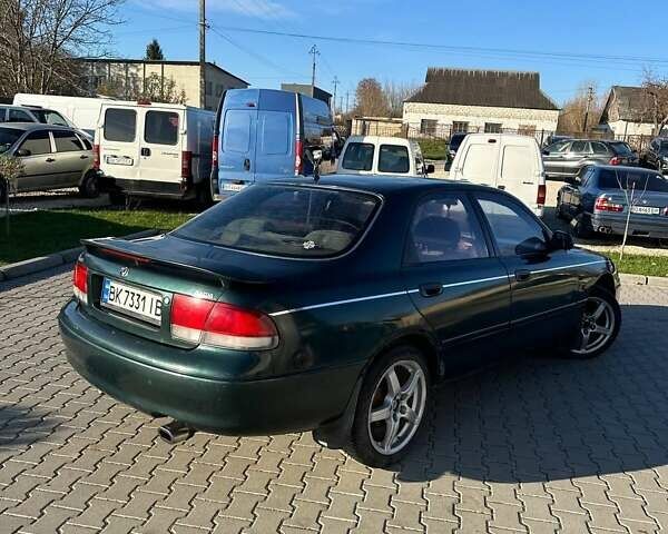 Зеленый Мазда 626, объемом двигателя 2 л и пробегом 300 тыс. км за 1300 $, фото 16 на Automoto.ua