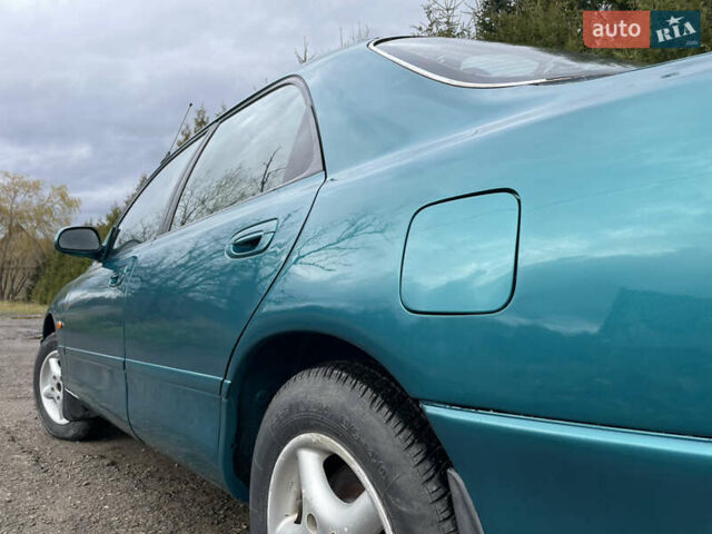 Зеленый Мазда 626, объемом двигателя 2 л и пробегом 401 тыс. км за 1750 $, фото 16 на Automoto.ua