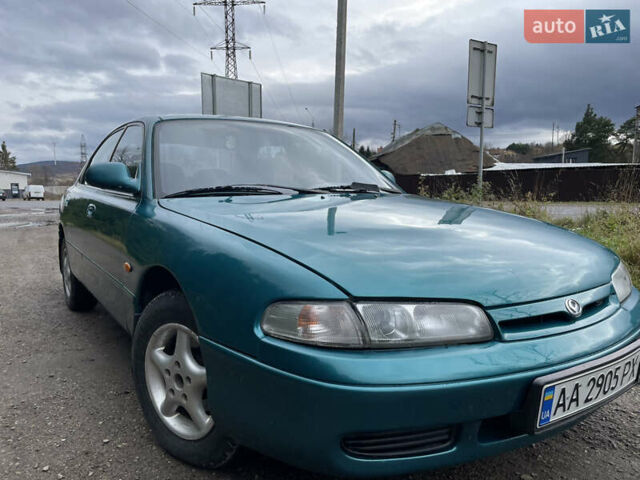 Зеленый Мазда 626, объемом двигателя 2 л и пробегом 401 тыс. км за 1750 $, фото 6 на Automoto.ua