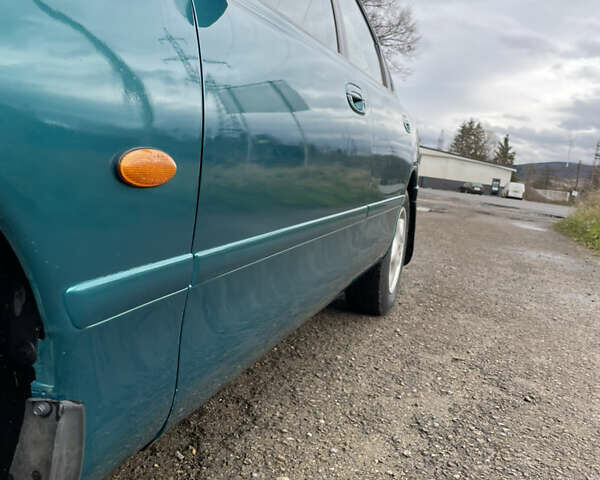 Зеленый Мазда 626, объемом двигателя 2 л и пробегом 401 тыс. км за 1750 $, фото 5 на Automoto.ua