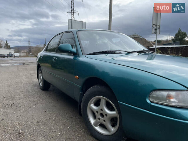 Зеленый Мазда 626, объемом двигателя 2 л и пробегом 401 тыс. км за 1750 $, фото 7 на Automoto.ua