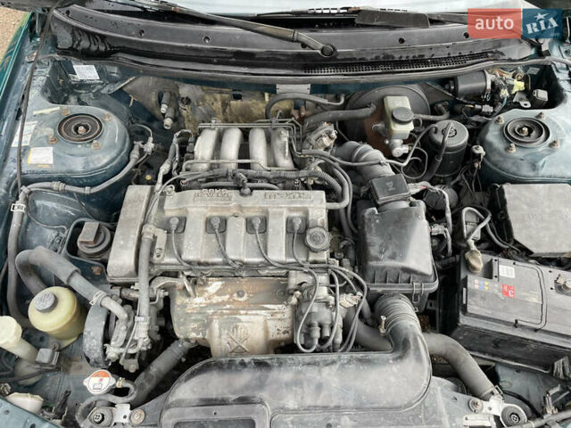 Зеленый Мазда 626, объемом двигателя 2 л и пробегом 401 тыс. км за 1750 $, фото 21 на Automoto.ua