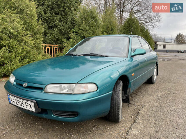 Зеленый Мазда 626, объемом двигателя 2 л и пробегом 401 тыс. км за 1750 $, фото 2 на Automoto.ua