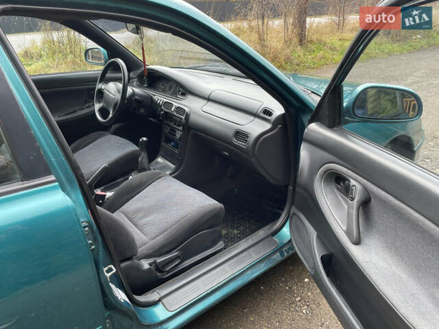 Зеленый Мазда 626, объемом двигателя 2 л и пробегом 401 тыс. км за 1750 $, фото 19 на Automoto.ua