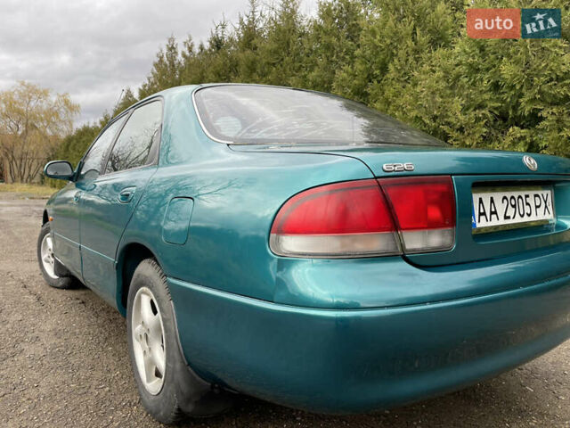 Зеленый Мазда 626, объемом двигателя 2 л и пробегом 401 тыс. км за 1750 $, фото 13 на Automoto.ua