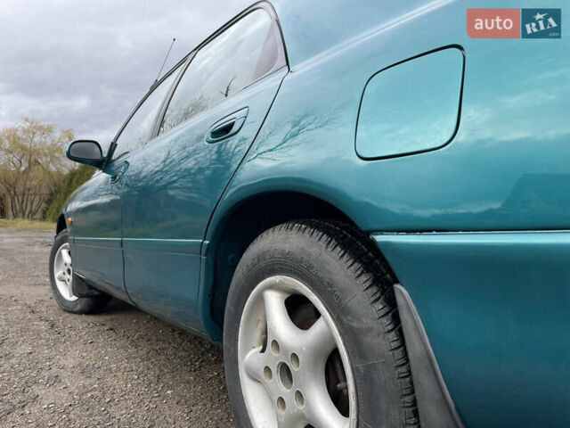 Зеленый Мазда 626, объемом двигателя 2 л и пробегом 401 тыс. км за 1750 $, фото 14 на Automoto.ua