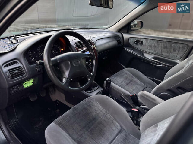 Зеленый Мазда 626, объемом двигателя 2 л и пробегом 309 тыс. км за 2100 $, фото 8 на Automoto.ua