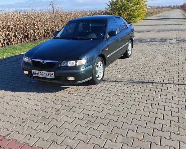 Зеленый Мазда 626, объемом двигателя 2 л и пробегом 378 тыс. км за 2600 $, фото 8 на Automoto.ua