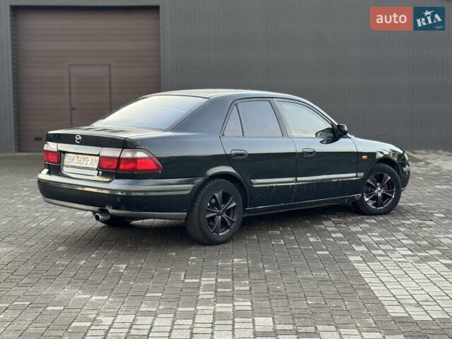 Зеленый Мазда 626, объемом двигателя 2 л и пробегом 309 тыс. км за 2100 $, фото 5 на Automoto.ua