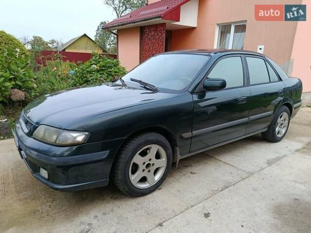 Зеленый Мазда 626, объемом двигателя 2 л и пробегом 270 тыс. км за 1800 $, фото 7 на Automoto.ua