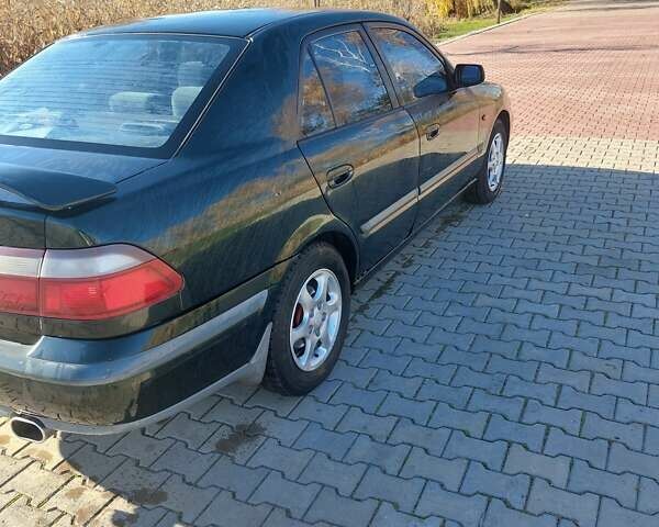 Зеленый Мазда 626, объемом двигателя 2 л и пробегом 378 тыс. км за 2600 $, фото 5 на Automoto.ua