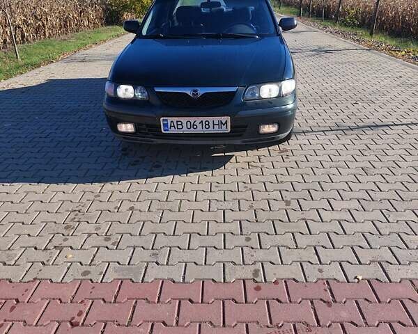 Зеленый Мазда 626, объемом двигателя 2 л и пробегом 378 тыс. км за 2600 $, фото 7 на Automoto.ua