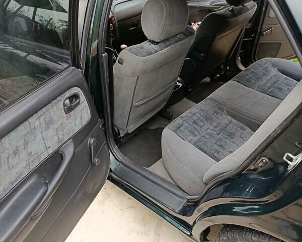 Зеленый Мазда 626, объемом двигателя 2 л и пробегом 270 тыс. км за 1800 $, фото 17 на Automoto.ua