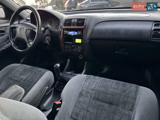 Зеленый Мазда 626, объемом двигателя 2 л и пробегом 309 тыс. км за 2100 $, фото 14 на Automoto.ua