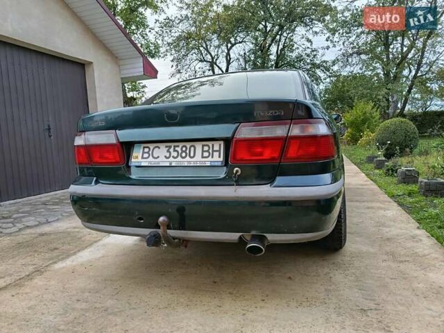 Зеленый Мазда 626, объемом двигателя 2 л и пробегом 270 тыс. км за 1800 $, фото 4 на Automoto.ua