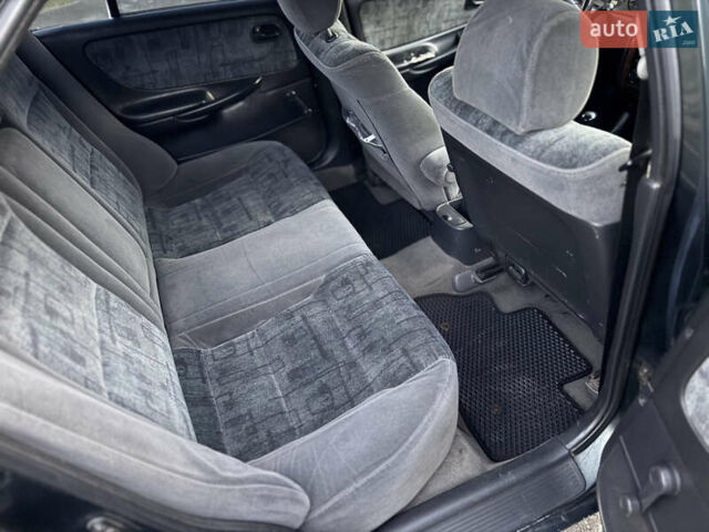 Зеленый Мазда 626, объемом двигателя 2 л и пробегом 309 тыс. км за 2100 $, фото 13 на Automoto.ua