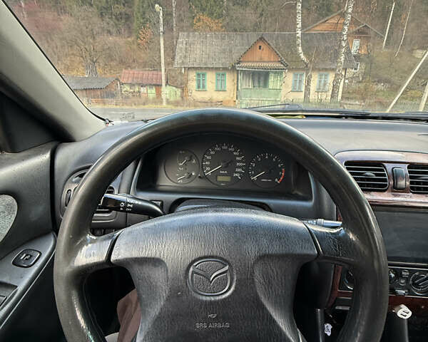 Зеленый Мазда 626, объемом двигателя 2 л и пробегом 356 тыс. км за 2100 $, фото 6 на Automoto.ua