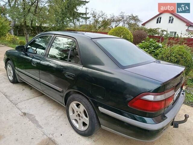 Зеленый Мазда 626, объемом двигателя 2 л и пробегом 270 тыс. км за 1800 $, фото 5 на Automoto.ua