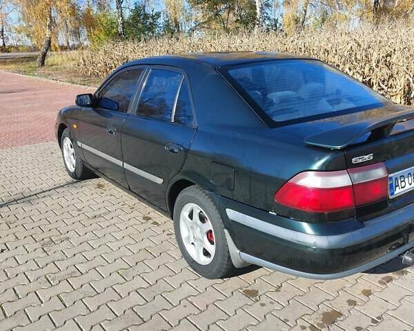 Зеленый Мазда 626, объемом двигателя 2 л и пробегом 378 тыс. км за 2600 $, фото 2 на Automoto.ua