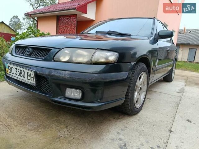 Зеленый Мазда 626, объемом двигателя 2 л и пробегом 270 тыс. км за 1800 $, фото 2 на Automoto.ua