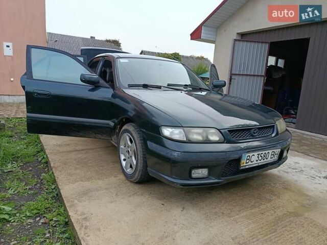 Зеленый Мазда 626, объемом двигателя 2 л и пробегом 270 тыс. км за 1800 $, фото 11 на Automoto.ua