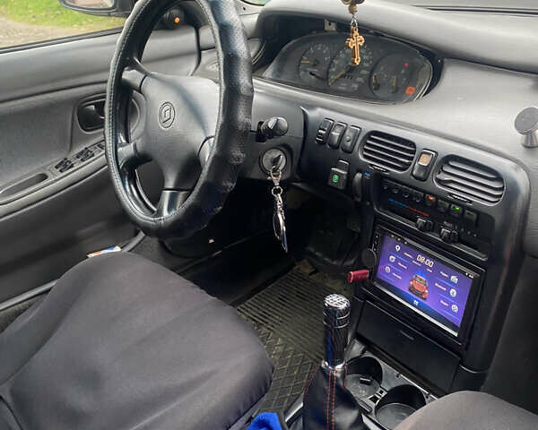 Зелений Мазда 626, об'ємом двигуна 2 л та пробігом 307 тис. км за 1500 $, фото 5 на Automoto.ua