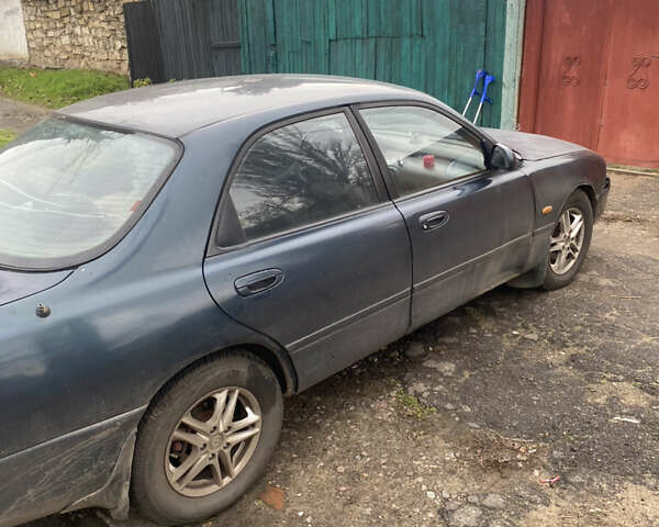 Зелений Мазда 626, об'ємом двигуна 2 л та пробігом 307 тис. км за 1500 $, фото 3 на Automoto.ua