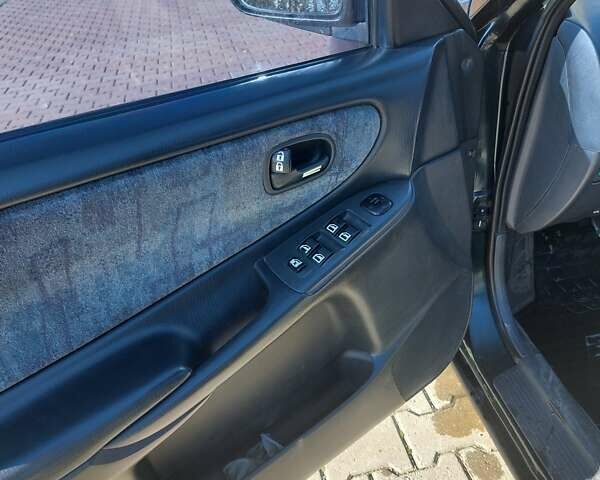 Зеленый Мазда 626, объемом двигателя 2 л и пробегом 378 тыс. км за 2600 $, фото 9 на Automoto.ua