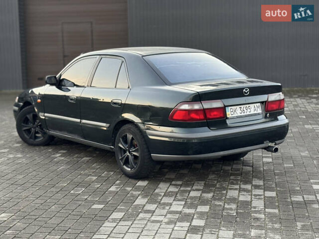Зеленый Мазда 626, объемом двигателя 2 л и пробегом 309 тыс. км за 2100 $, фото 6 на Automoto.ua