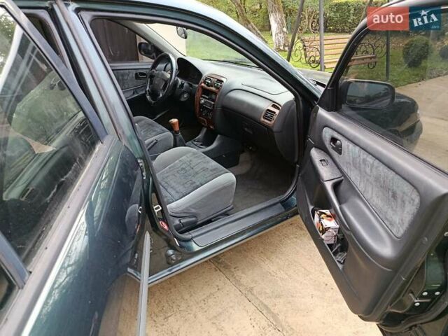 Зеленый Мазда 626, объемом двигателя 2 л и пробегом 270 тыс. км за 1800 $, фото 14 на Automoto.ua