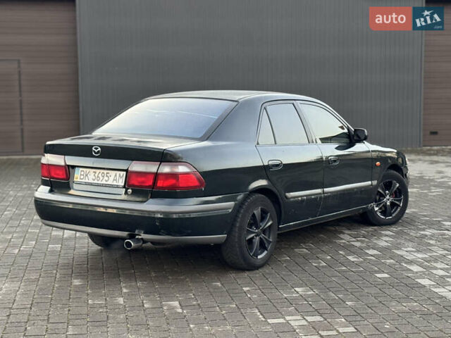 Зеленый Мазда 626, объемом двигателя 2 л и пробегом 309 тыс. км за 2100 $, фото 4 на Automoto.ua