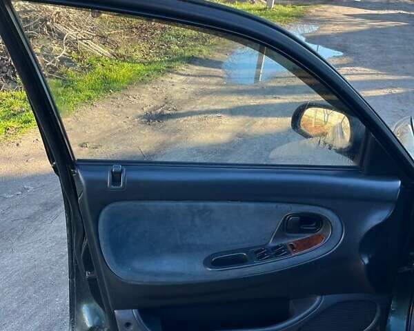 Зеленый Мазда 626, объемом двигателя 2.02 л и пробегом 300 тыс. км за 1450 $, фото 6 на Automoto.ua