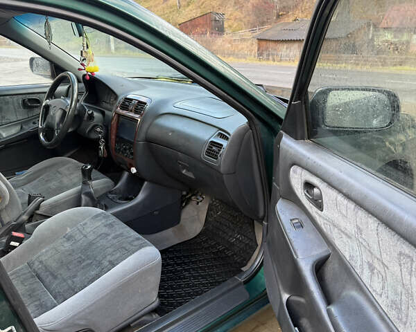 Зеленый Мазда 626, объемом двигателя 2 л и пробегом 356 тыс. км за 2100 $, фото 14 на Automoto.ua