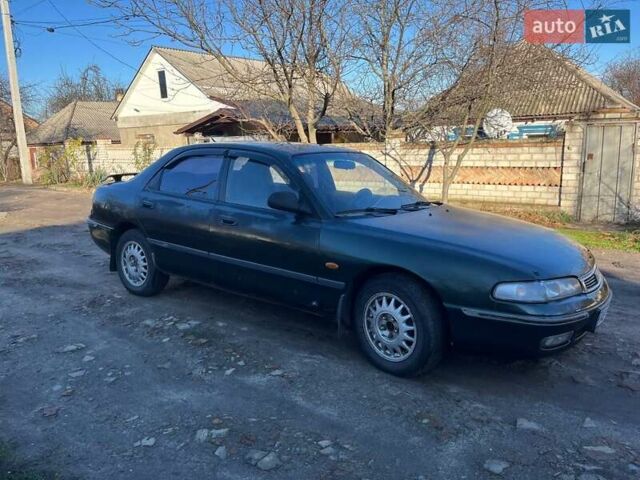 Зеленый Мазда 626, объемом двигателя 2.02 л и пробегом 300 тыс. км за 1450 $, фото 1 на Automoto.ua