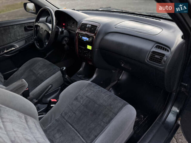 Зеленый Мазда 626, объемом двигателя 2 л и пробегом 309 тыс. км за 2100 $, фото 12 на Automoto.ua