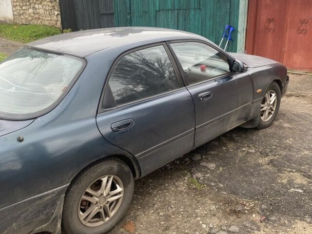 Зеленый Мазда 626, объемом двигателя 2 л и пробегом 3 тыс. км за 1500 $, фото 2 на Automoto.ua