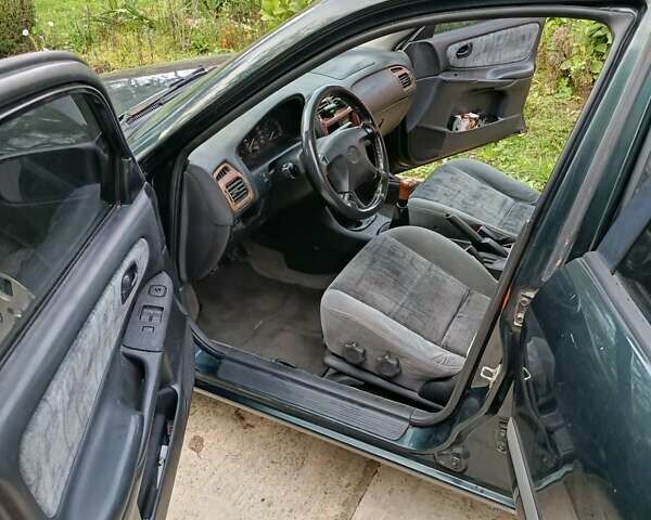 Зеленый Мазда 626, объемом двигателя 2 л и пробегом 270 тыс. км за 1800 $, фото 13 на Automoto.ua