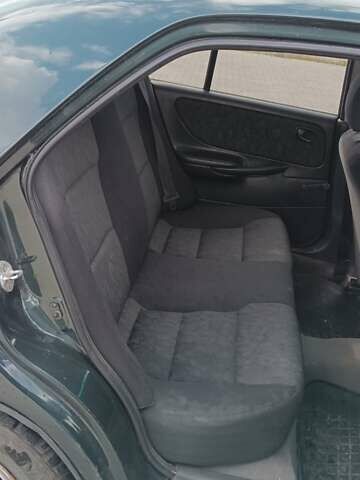 Зеленый Мазда 626, объемом двигателя 1.84 л и пробегом 319 тыс. км за 1700 $, фото 8 на Automoto.ua