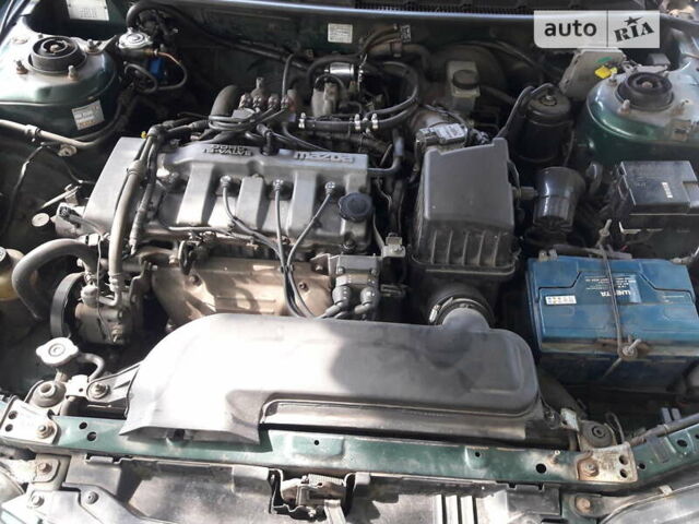 Зеленый Мазда 626, объемом двигателя 1.8 л и пробегом 315 тыс. км за 3200 $, фото 8 на Automoto.ua