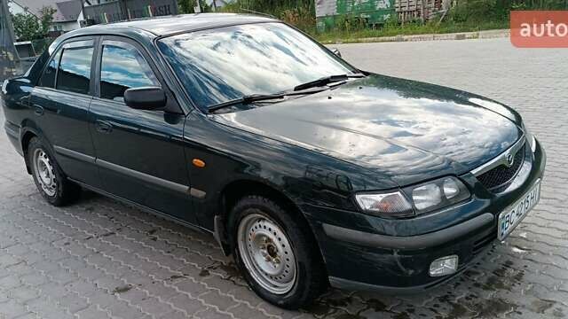 Зеленый Мазда 626, объемом двигателя 1.84 л и пробегом 319 тыс. км за 1700 $, фото 1 на Automoto.ua