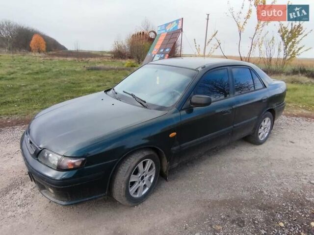 Зеленый Мазда 626, объемом двигателя 1.84 л и пробегом 421 тыс. км за 2500 $, фото 1 на Automoto.ua