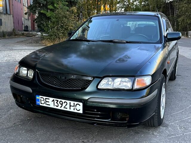 Зеленый Мазда 626, объемом двигателя 2 л и пробегом 185 тыс. км за 2350 $, фото 3 на Automoto.ua