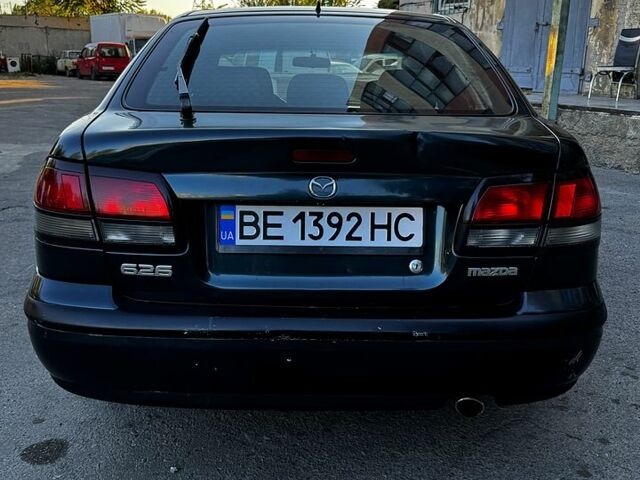 Зеленый Мазда 626, объемом двигателя 2 л и пробегом 185 тыс. км за 2350 $, фото 6 на Automoto.ua