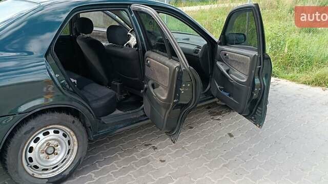 Зеленый Мазда 626, объемом двигателя 1.84 л и пробегом 319 тыс. км за 1700 $, фото 10 на Automoto.ua