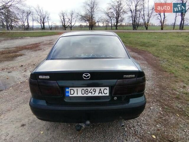 Зеленый Мазда 626, объемом двигателя 1.84 л и пробегом 421 тыс. км за 2500 $, фото 9 на Automoto.ua