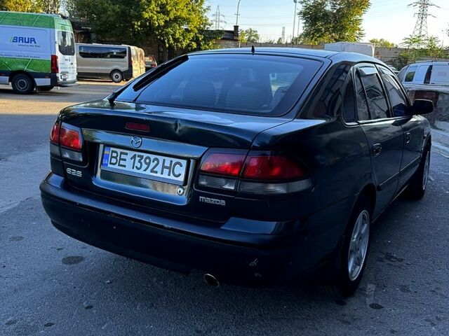 Зеленый Мазда 626, объемом двигателя 2 л и пробегом 185 тыс. км за 2350 $, фото 5 на Automoto.ua