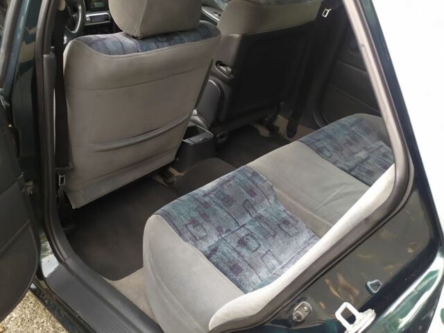 Зеленый Мазда 626, объемом двигателя 2 л и пробегом 250 тыс. км за 3600 $, фото 2 на Automoto.ua