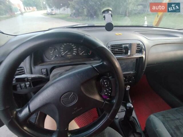 Зеленый Мазда 626, объемом двигателя 1.84 л и пробегом 421 тыс. км за 2500 $, фото 10 на Automoto.ua